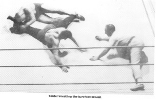 For the remainder of the match Eklund stretched, controlled, and dominated
Ad Santel. Here the Octopus applies an old time leg/groin stretch, this hold was a weardown hold very common in matches of th