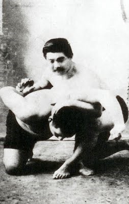 Maeda demonstrating a hammerlock and half Nelson Maeda demonstrating a hammerlock and half Nelson