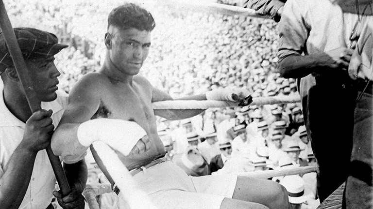 Talk of a potential mixed match between Jack Demspey (above) and Lewis (below with Sandow) kept the sports world ablaze during the 1920's. Talk of a potential mixed match between Jack Demspey (above) and Lewis (below with Sandow) kept the sports world ablaze during the 1920's.