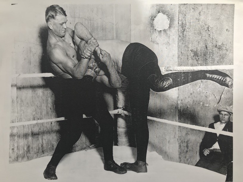 Pesek clamping a double wristlock on workout partner Joe Zikmund. Pesek clamping a double wristlock on workout partner Joe Zikmund.