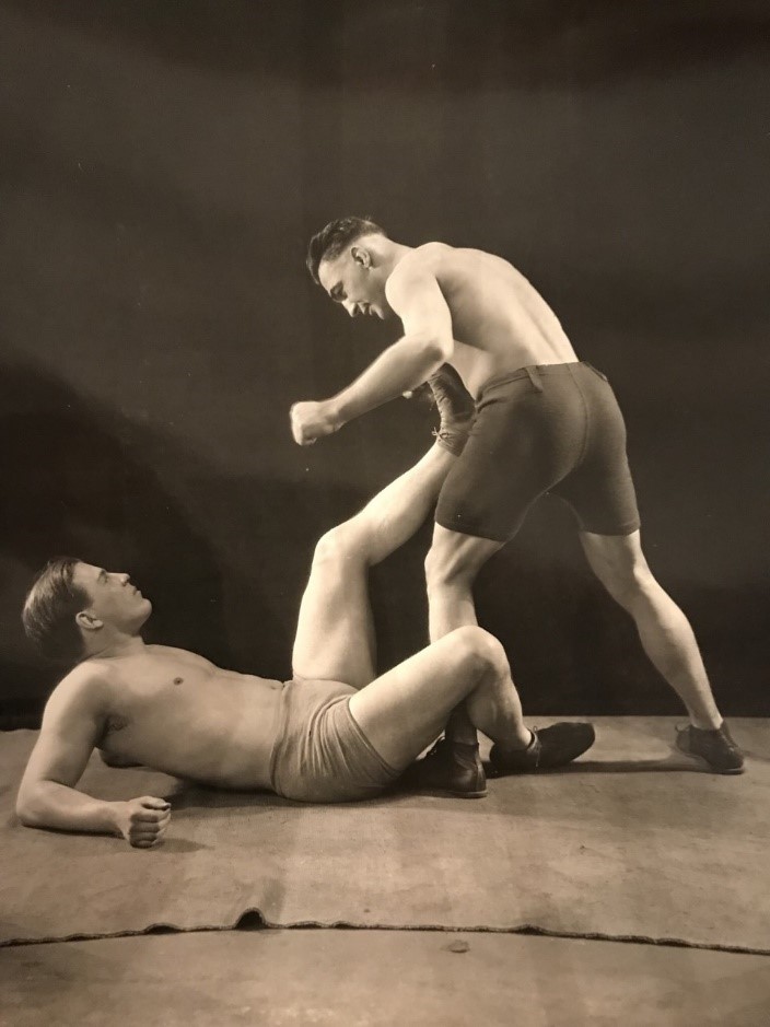 Pendleton demonstrated how he would handle a boxer in a series of photographs posed with Paul Berlenbach. He described, If one foot is in advance of the other, I quickly execute the flying slide, attacking with my legs...Picture me as sliding as would Babe Ruth for home plate...Strangler Lewis works this attack with marked success against the leading wrestlers of the world...- (Muscle Builder, Sept. 1924) This was also one of the main self-defense tactics taught by Sandow. Pendleton demonstrated how he would handle a boxer in a series of photographs posed with Paul Berlenbach. He described, If one foot is in advance of the other, I quickly execute the flying slide, atta