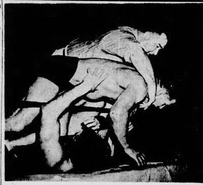 Referee Strangler Lewis pulls Ray Steele off Lou Thesz in a St. Louis match 11/20/41. Steele successfully defended his NWA world heavyweight championship. Referee Strangler Lewis pulls Ray Steele off Lou Thesz in a St. Louis match 11/20/41. Steele successfully defended his NWA world heavyweight championship.